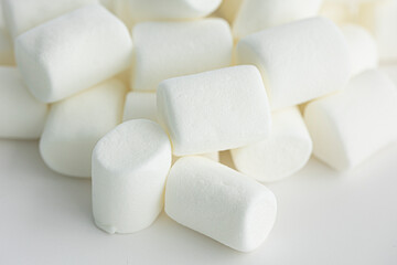 Heap of white marshmallows, isolated on white background