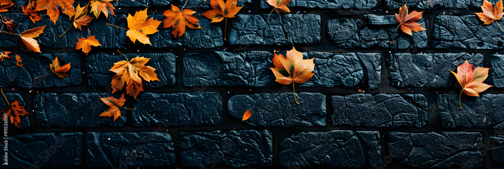 Poster autumn background with leaves on textured stone wall. top view. autumn banner template with space fo