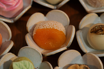 close up of candies, candies in a box, candies in a box, close up of chocolate candies, sweets...