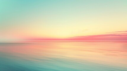Fototapeta premium A serene seascape at sunset, showcasing soft pastel colors blending harmoniously over calm waters.