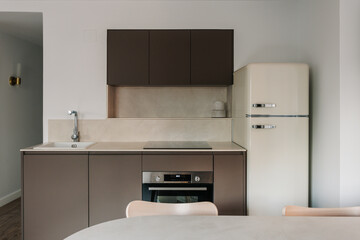 small kitchen in stylish studio apartment