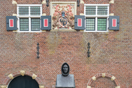 detail of  weigh house from year 1650 with statue of monk Uffing in Workum, which is  one of the Eleven Cities of Friesland in The  Netherlands