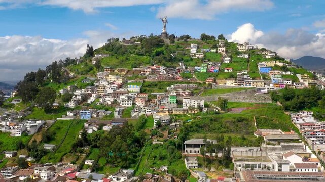 El Panecillo hillside houses Virgin of Quito statue Ecuador South America.