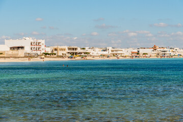 Fototapeta premium Punta Prosciutto, Puglia, Italy - October 7, 2023: White beach of Punta Prosciutto on the Ionian sea in province of Lecce.
