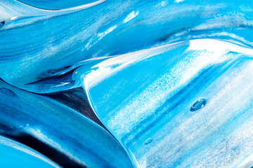 Blue background with oil paint. Abstract acrylic paint texture. Beautiful brushstrokes close-up