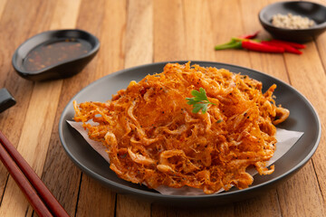 Thai Styled Shrimp Fritter,Asian Street Food.Deep fried small shrimp with chilli dipping sauce.