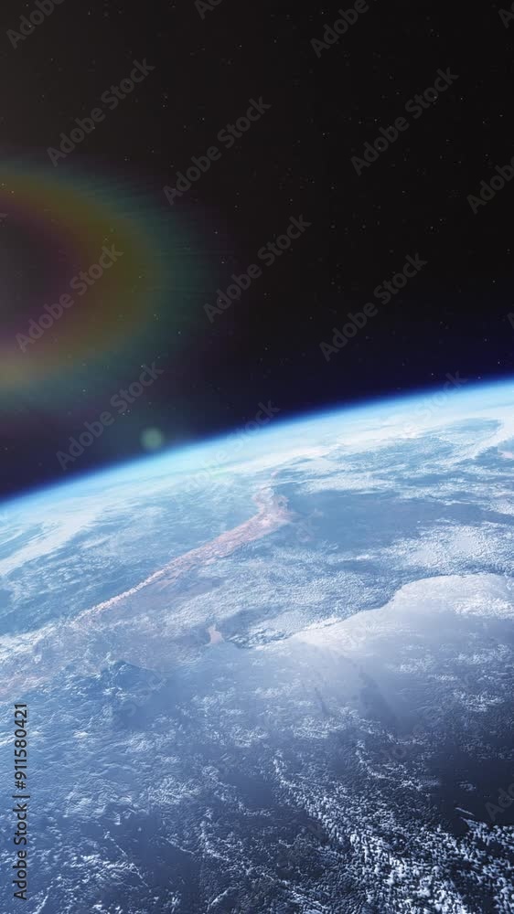 Wall mural partial earth view from space – vertical shot with starry background