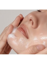 Fototapeta premium Disinfection and selfcare Closeup of a woman disinfecting skin, focusing on relaxation and personal care