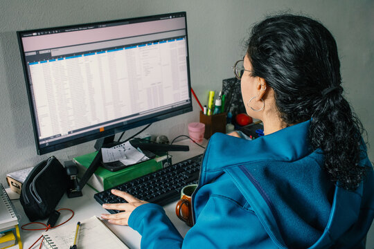 Woman Working from Home Office with Complete Setup