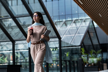 Tech professional outside business area with digital tablet