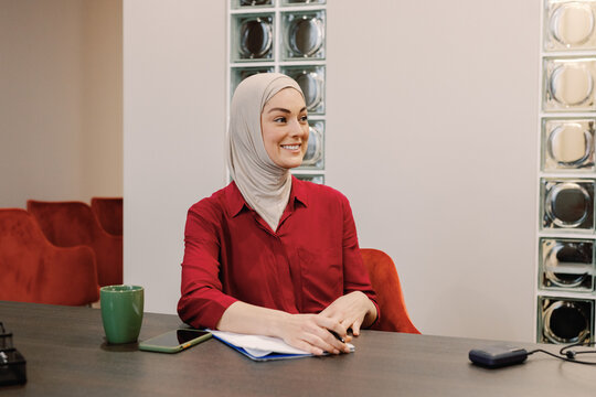 Confident foreign employee working routine tech startup company
