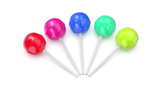 Five different lollipops on a white background
