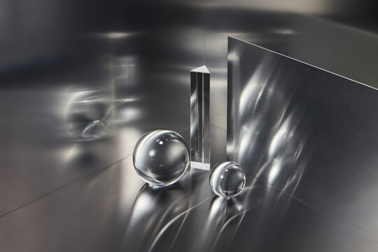 Transparent glass balls projecting light on metallic walls