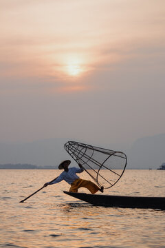 Fisherman with Net at Sunset on Inle Lake