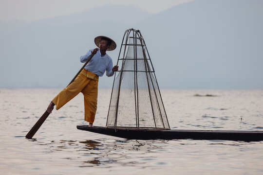 Fisherman with Traditional Net on Inle Lake