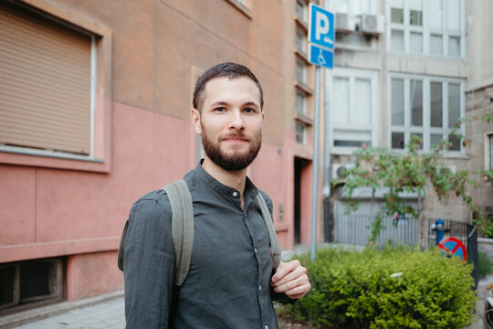 Portrait of a man standing on the street 
