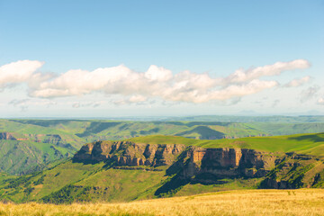Fototapeta premium A picturesque landscape with a rocky cliff plateau. Elbrus region