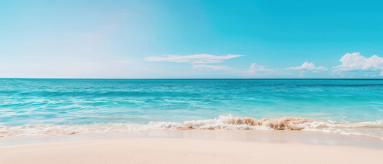 Obraz premium Stunning beach scene with turquoise waters, soft sand, and a clear blue sky, perfect for relaxation and tropical escape.