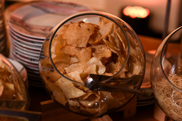  chops and vegetables, rolled potatoes, french fries, buffet, food on the table