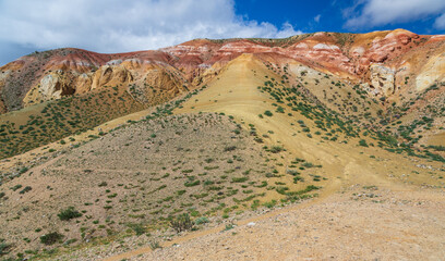 Fantastic mountain natural landscape with bright color transitions and blue clear sky in place named Mars 2, Altai Republic, Russia. Unearthly Martian landscapes
