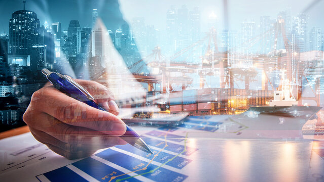 Businessman investment stock finance profit graph of marketing financial increase and check for control loading containers box from Cargo freight ship for import and export, transport