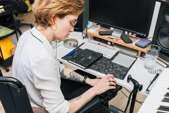 Disabled Woman Working in Home Office