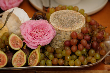 artisanal cheese, christmas still life, christmas table setting,  cheese and fruits,  fresh grapes,...