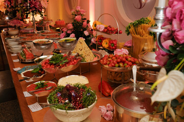 table in a restaurant, salad in the kitchen, buffet table with food, buffet food in a restaurant, tomatoes in a bowl, cherry tomatoes, fresh tomatoes, tomato salad, buffetthanksgiving day