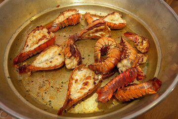 seafood  in a pan, lobster au gratin, buffet, self service, lobster in the frying pan
