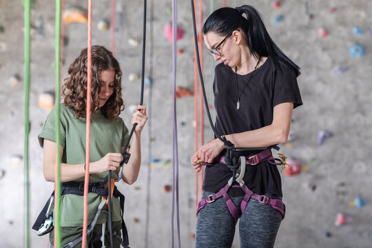 Friends Preparing for Climb - Powered by Adobe