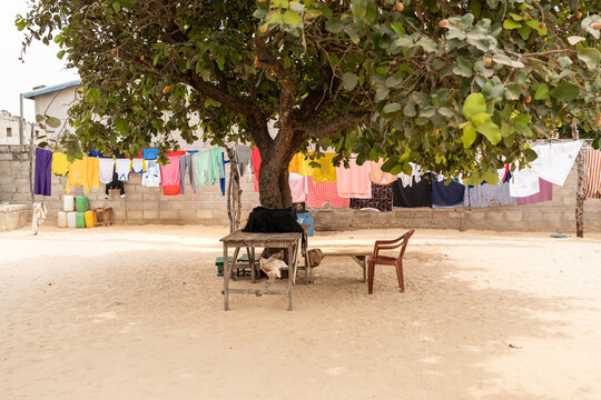 Colorful clothes are hanging to dry on a clothesline