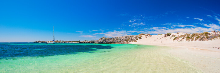 Stunning island bay with white sands and turquoise ocean