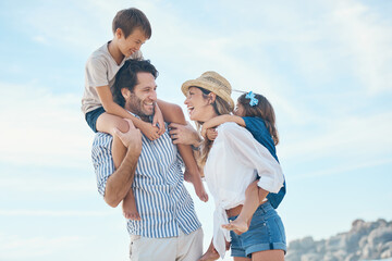 Family, smile and carrying on beach for travel, holiday and bonding together in summer with sunshine. Mom, dad and kids in nature for relax, vacation and relationship with shoulder ride and blue sky