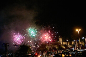Fireworks Display at Fiesta de la Anunciada in Bayona with Parador Backdrop