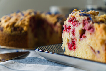 currant sweet cake on a laid table