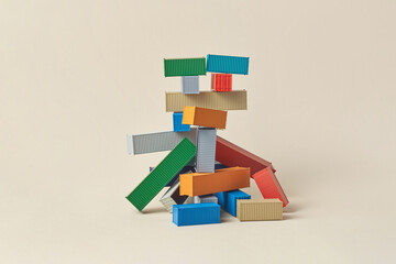 Chaotically scattered metal containers creating fragile structure