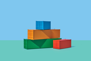 Red container standing on side of multi coloured stacked cargo