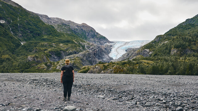 Hiker watching glacier 