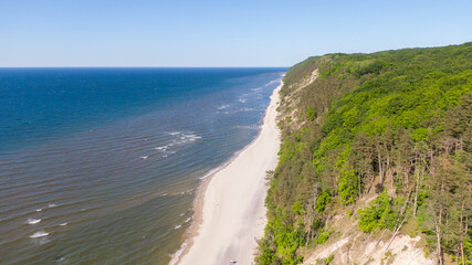 Coast of Baltic Sea in Miedzyzdroje, Poland. Aerial view on Beach and water, Drone photo