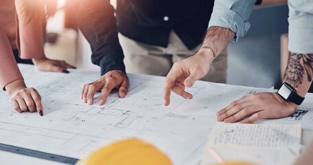 Hands, architect and blueprint sketch with clients for floor plan, drawing or renovation meeting of building construction. Group, contractor and document, planning and ideas of infrastructure project © Tinashe Njaku/peopleimages.com