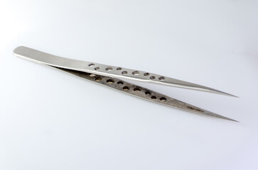 Stainless steel soldering tweezers close up