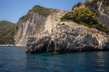Fototapeta premium Beautiful Landscape of Rocky Coast in Zakynthos. Summer Scenery of Stony Cliff with Ionian Sea in Greece.