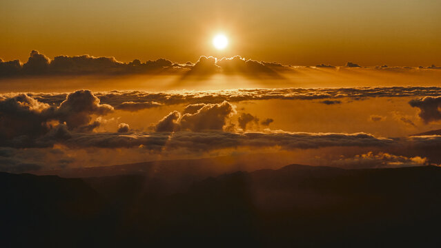 Radiant Sunset Above Cloud Layers