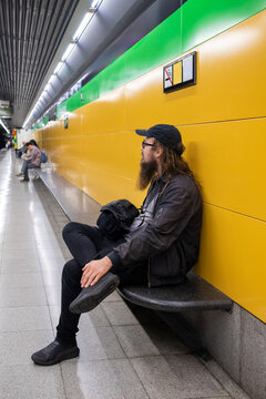 Man waiting for a subway train