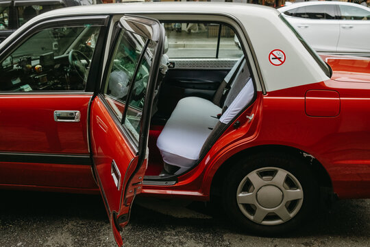 Car door open on a street in Kyoto, Japan