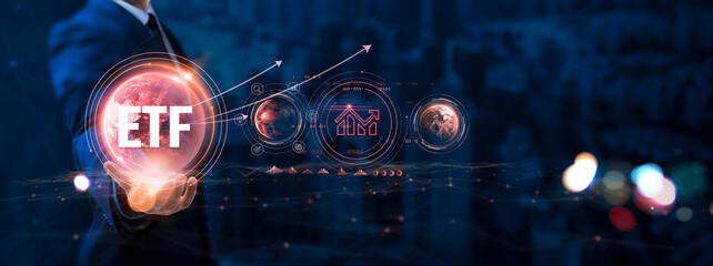 ETF: Businessman hand holding globe with network connecting data of digital technology, diversified...