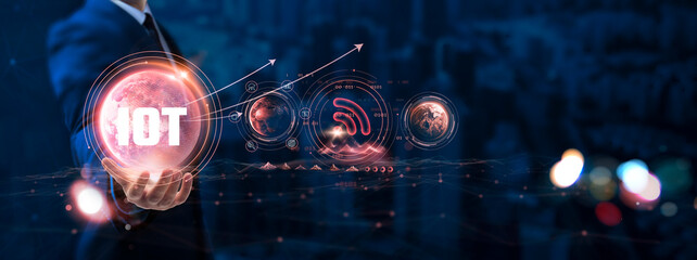 IoT: Businessman hand holding globe with network connecting data of digital technology, smart...
