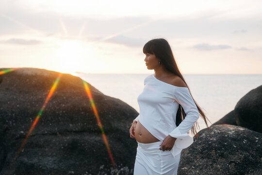 Stylish pregnant woman