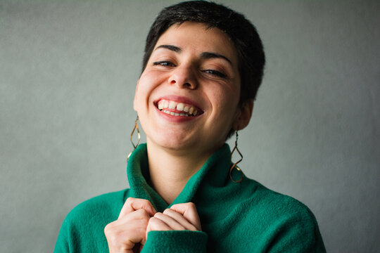 Silly portrait of woman with tooth gap, sincere smile
