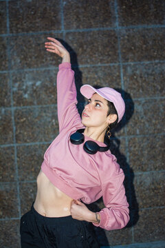 Latina dancing candid flash portrait